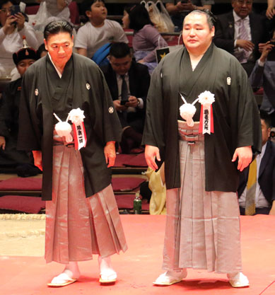 Master and disciple bow