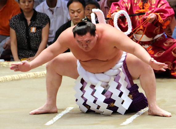 Yokozuna Hakuho performing the dohyo-iri ring-entering ceremony
